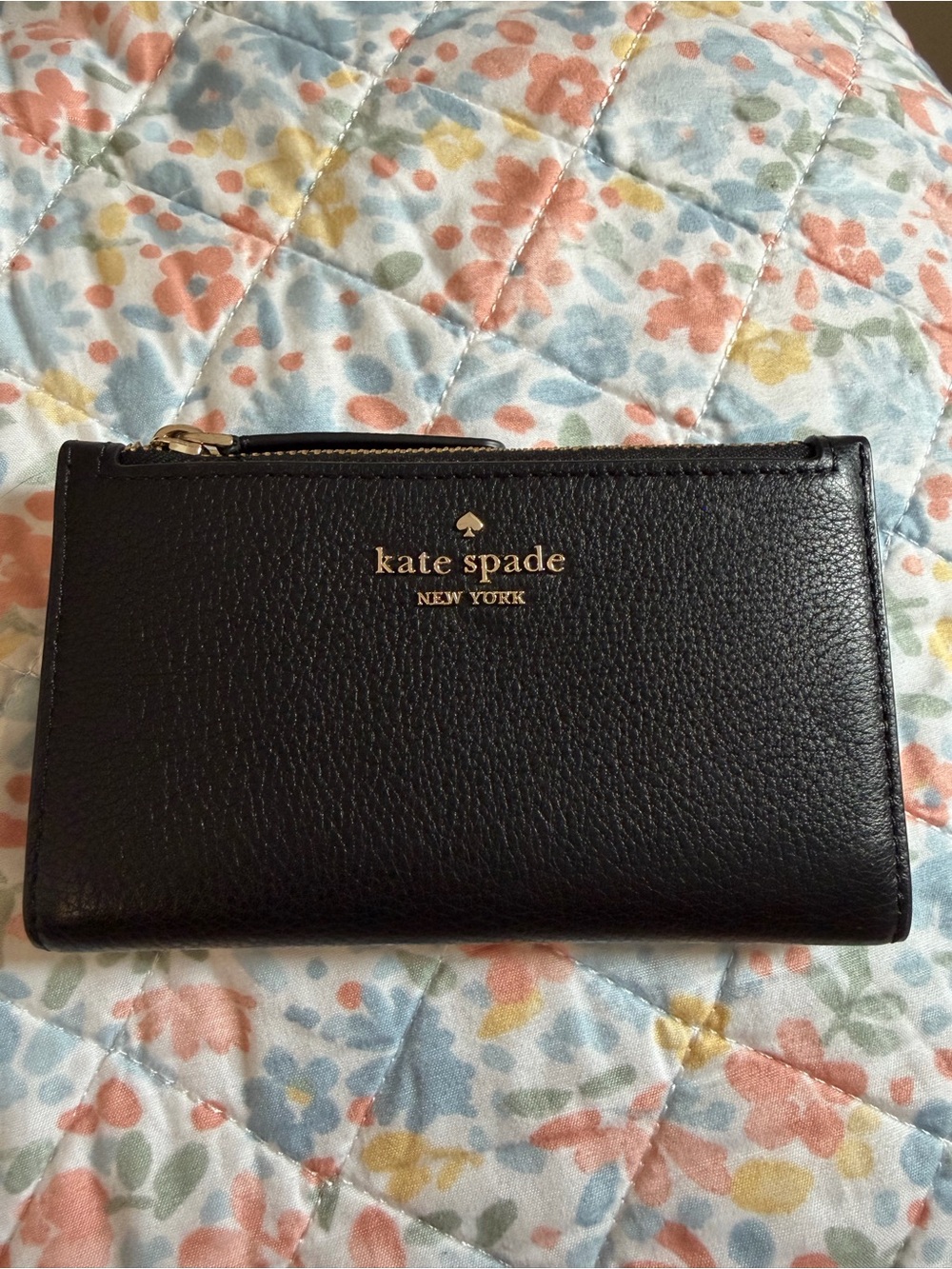 kate spade black leather zip card wallet with gold logo